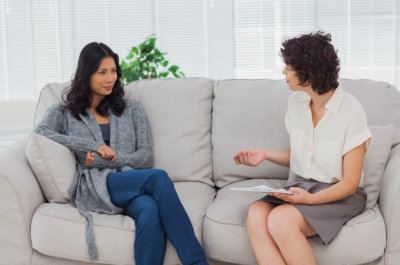 two women looking at each other